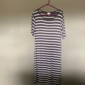 Form fitting, stretchy material dress.